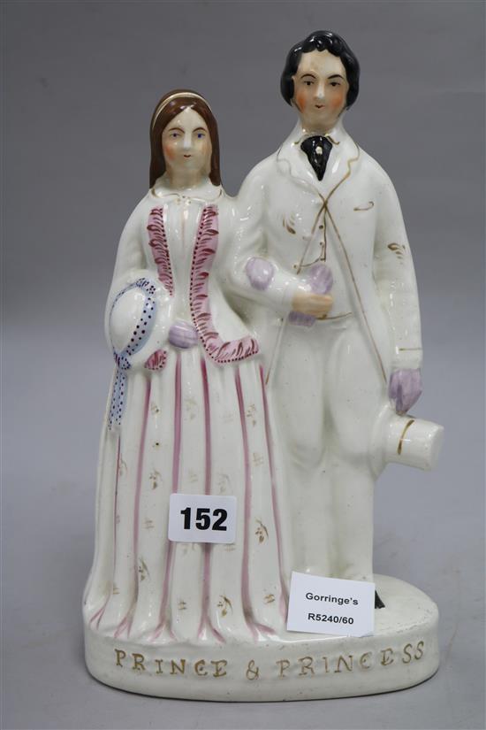 A Staffordshire pottery group The Prince and Princess height 30cm
